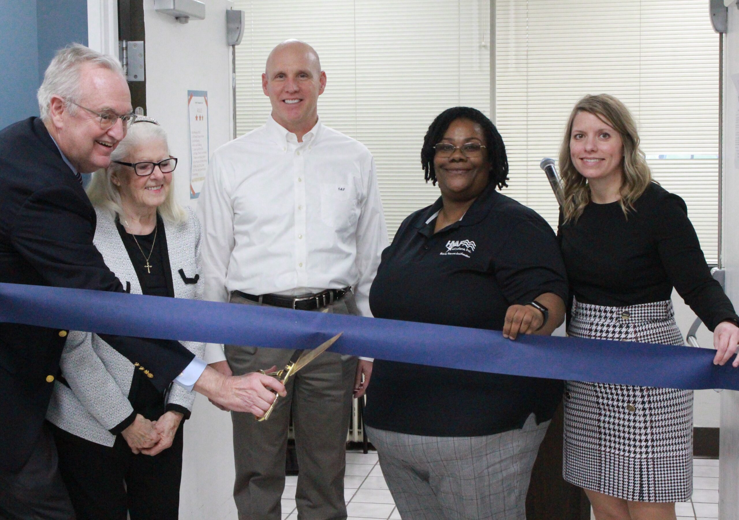 Pictured left to right: Col. Moreau's son, Bill; Col. Moreau's wife, Ann; HVAF Board Chairman Arne Pedersen, HVAF Community Center Specialist Katie Zackery; HVAF CEO Emmy Hildebrand